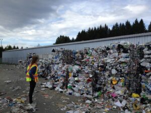 Person working at a waste management plant